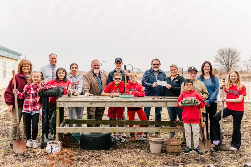 Fourth grade teacher Beverly Odell, Callie Odell, fifth grade teacher Tony Clausen, Odett Johnson, Elissa Slevin, Dennis Taylor with Taylor’s Way, Braxton Bickett, Solomon Cowser, Marshall Gray, Principal Steve Lunger, Jill Frueh with the Bureau County Farm Bureau, Levi Eggers, Enrique Valle, Laurie Cowser and Miriam Bayer gather for a photo as Princeton Christian Academy was awarded a $1,000 Spring Ag Literacy Grant through the Bureau County Farm Bureau Foundation.