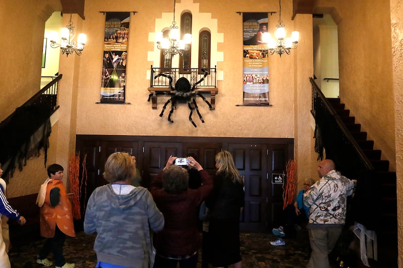 People look at the lobby before a showing of “Hocus Pocus” at the Northwest Herald, Shaw Local News Network Subscriber Appreciation event Sunday, Oct. 15, 2023, at the Raue Center For the Arts in Crystal Lake.