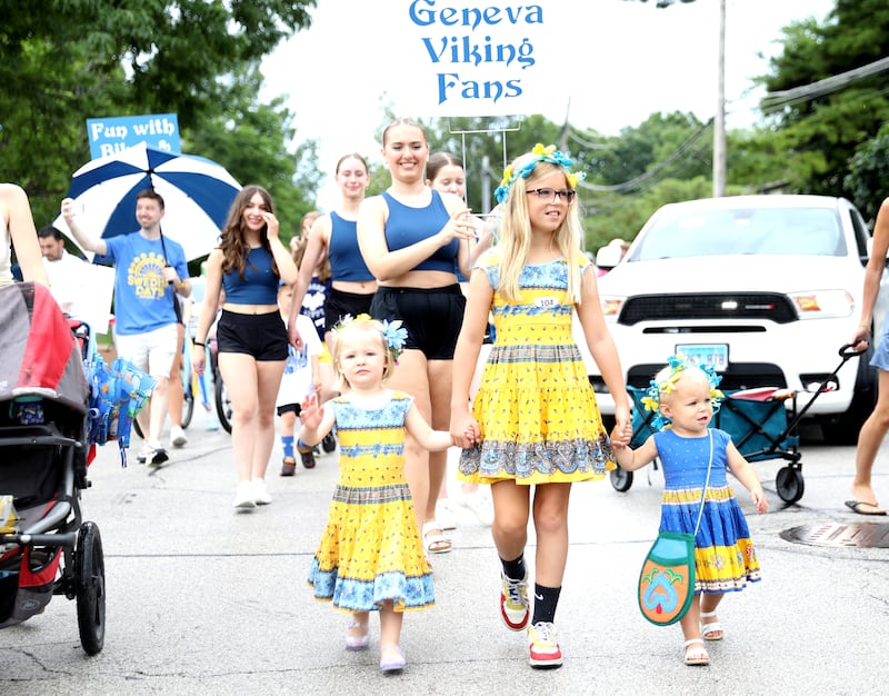 (Left to right) Svea Nelson, 2, Eba Wendell, 10, and Jewel Wendell, 2, all of Geneva, participate in the annual Swedish Days Kids’ Day Parade on Friday, June 20, 2025 in Geneva.
