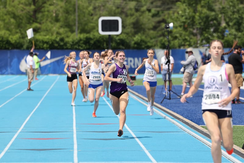 Manteno’s Klarke Goranson, center, finishes in second place in the 800 m run during the IHSA Class 2A Girls Track & Field State Finals on Saturday, May 24, 2025.