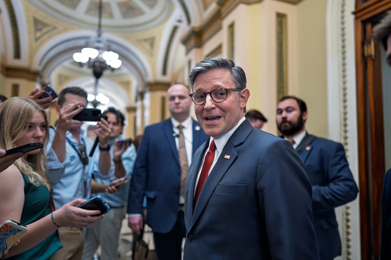 Speaker of the House Mike Johnson, R-La., pauses to speak to reporters as he enters the chamber to prepare for final passage of President Donald Trump's signature bill of tax breaks and spending cuts, at the Capitol in Washington, Thursday, July 3, 2025. (AP Photo/J. Scott Applewhite)