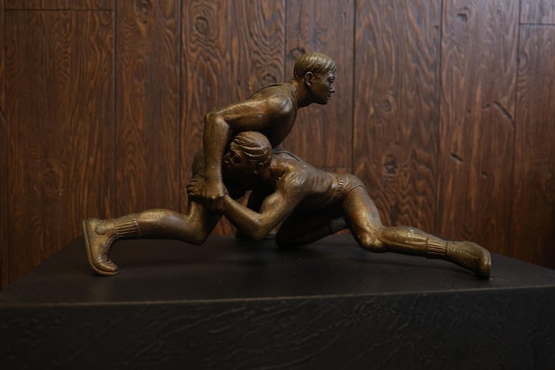 Guest are greeted at Rovanco Piping Systems with the Pan Am youth wrestling championship trophy won by Rovanco founder Larry Stonitsch’s wrestling team.