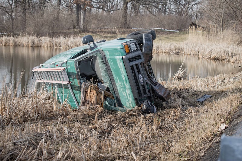 A driver suffered minor injuries after crashing off Hartland Road into a marsh near Woodstock on March 19, 2026.