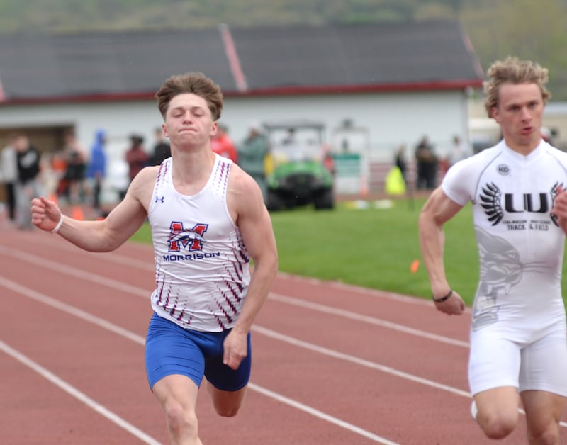 Morrison's Levi Milder (left) races Lena-Winslow's Alec Schlichting (right) to the finish line in the 100 meters at the Hawk Classic on Friday, May 2, 2025 at Landers-Loomis Field in Oregon. Schlichting won the race in 10.99 seconds and Milder was second in 11.09.