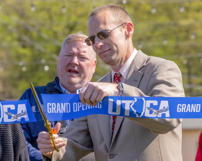 Utica Mayor David Stewart cuts the ribbon for the grand opening of Market On Mill on May 3, 2025 in Utica, Illinois.