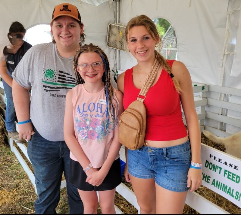 Pictured are Kaden Lingbeck, Hazel Friday and Lydia Sherburne in the Children’s Farm during Hazel’s volunteer shift