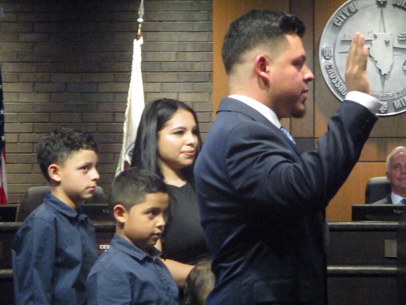 New Joliet Councilman Juan Moreno takes the oath of office on Monday with his family beside him. May 5, 2025