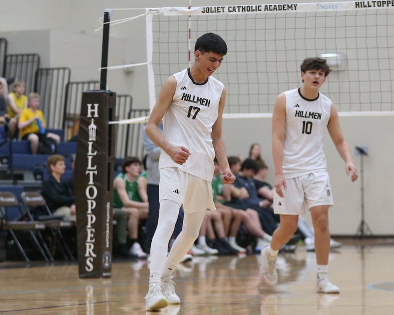 Joliet Catholic's Aydan Garcia (17) celebrates a kill during volleyball match between Providence Catholic at Joliet Catholic. March 25, 2025.