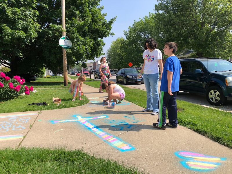 Congregants of Hebron's United Methodist Church decorated the sidewalk with rainbows and messages on Sunday, June 8, 2025, affirming their message accepting LGBTQI+ people at the church.