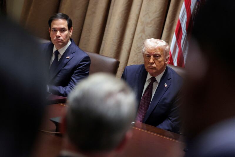 President Donald Trump, right, and Secretary of State Marco Rubio attend a cabinet meeting at the White House in Washington, Monday, March 24, 2025. (Pool via AP)