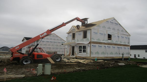 Pritzker’s affordable housing plan gets Senate hearing as municipalities remain opposed