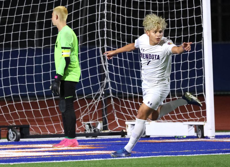 Mendota's Isaac Diaz celebrates after scoring a goal as Coal City's Carter Nicholson looks away Thursday, Nov. 6, 2025, during their Class 1A state semifinal game at Hoffman Estates High School.