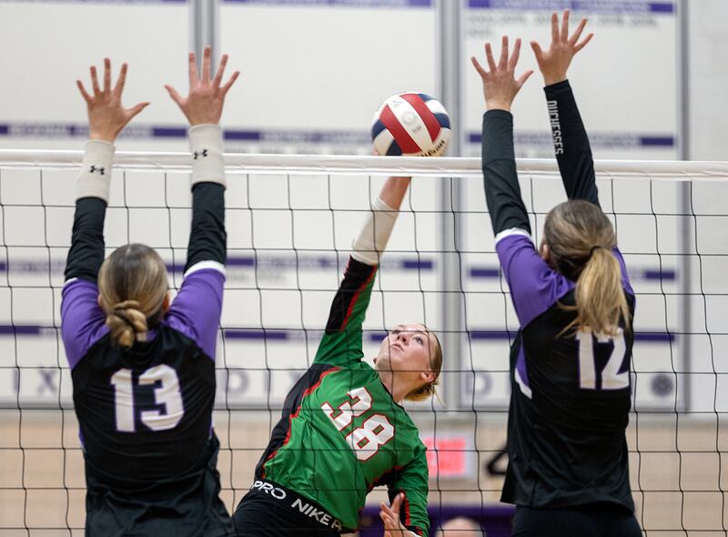 L-P’s Aubrey Duttlinger plays the ball against Dixon’s Solis Thompson (left) and Isabelle Quackboerner Tuesday, Oct. 29, 2024, at the class 3A regional semifinal in Dixon.