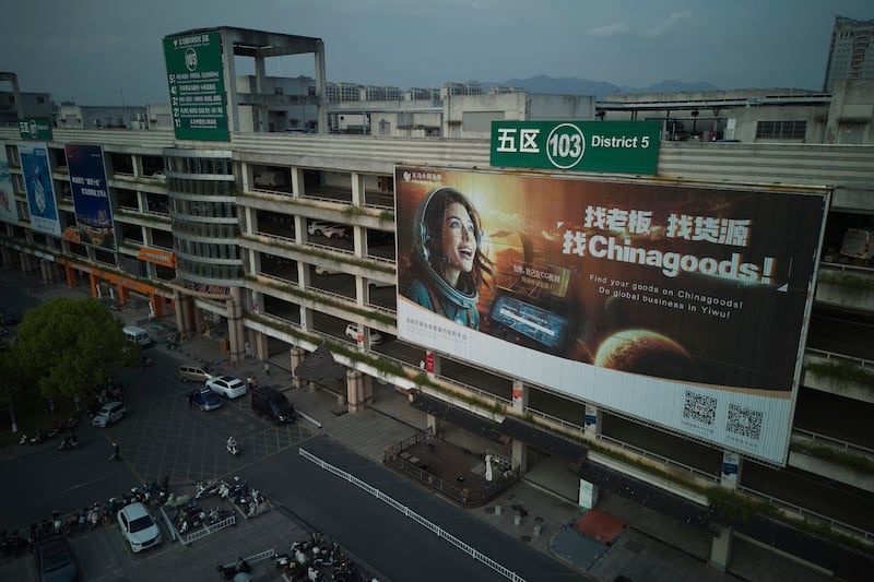 A giant billboard promotes Made in China goods at the Yiwu International Trade Market in Yiwu, eastern China's Zhejiang province on Thursday, April 10, 2025. (AP Photo/Ng Han Guan)