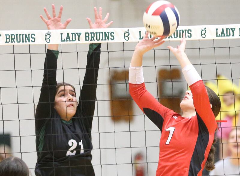 Henry-Senachwine's Lauren Harbison sets the ball in the air as St. Bede's Lily Bosnich looks on during the Class 1A Regional final game on Thursday, Oct. 31, 2024 at St. Bede Academy.