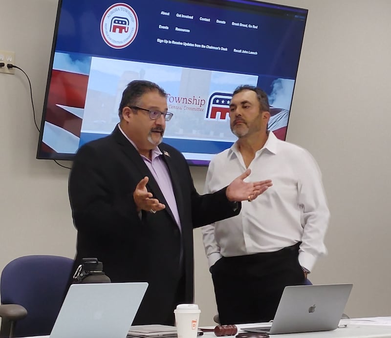 Aurora Township GOP Chairman Danny Souri (left) and Kane County GOP Chairman Andro Lerario discuss challenges to the local Republican Party at a meeting Wednesday, Oct. 1 in St. Charles.
