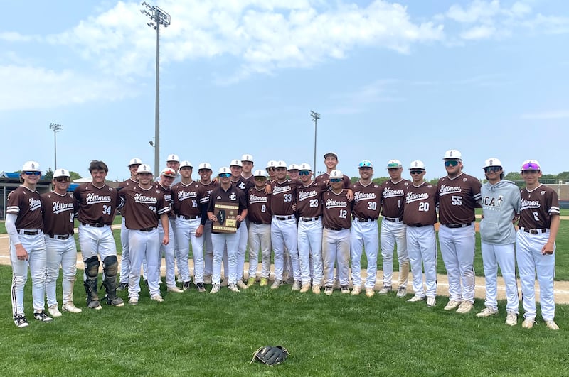 The Joliet Catholic Academy baseball club stands with its freshly captured Class 3A Pontiac Regional championship plaque after defeating Ottawa 6-0 on Saturday, May 31, 2025, in Pontiac.