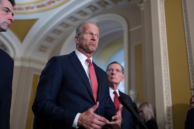 Senate Majority Leader John Thune, R-S.D., flanked by Sen. Tom Cotton, R-Ark., left, and Sen. John Barrasso, R-Wyo., speaks to reporters following a closed-door party meeting, at the Capitol in Washington, Tuesday, April 21, 2026. (AP Photo/J. Scott Applewhite)