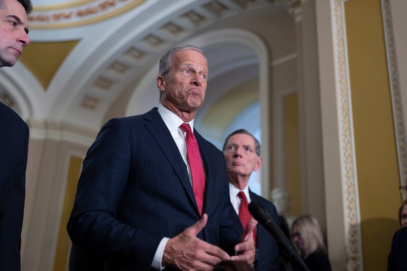Senate Majority Leader John Thune, R-S.D., flanked by Sen. Tom Cotton, R-Ark., left, and Sen. John Barrasso, R-Wyo., speaks to reporters following a closed-door party meeting, at the Capitol in Washington, Tuesday, April 21, 2026. (AP Photo/J. Scott Applewhite)