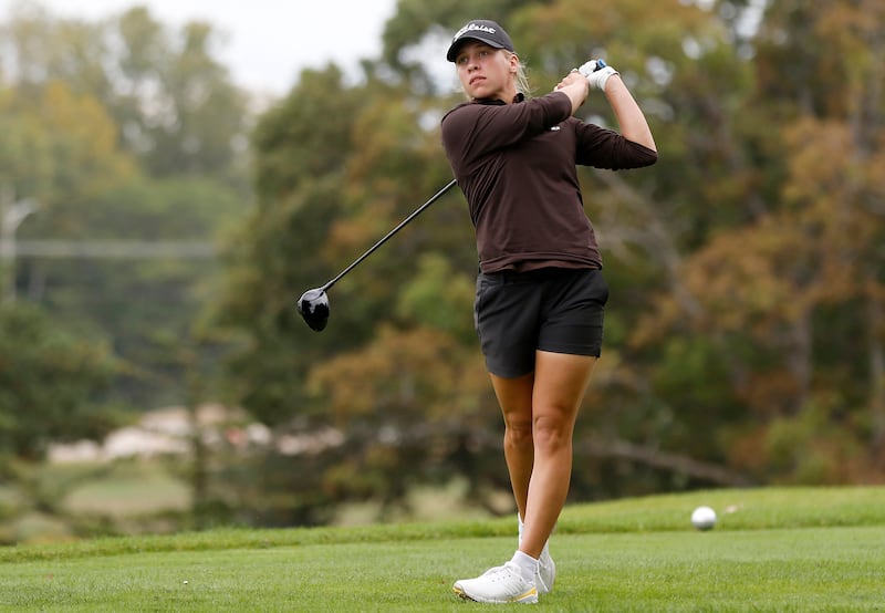 Jacobs’ Natalie Zimmerman watches her tee shot on the 14th hole during the Fox Valley Conference Girls Golf Tournament Wednesday, Sept. 24, 2025, at Crystal Woods Golf Club in Woodstock.