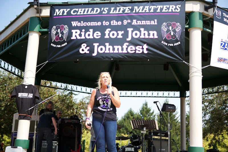 Kathy Zander speaks at the 9th Annual Ride for John and JohnFest for my child's life matters on Saturday Aug.2, 2025 in Carol Stream.