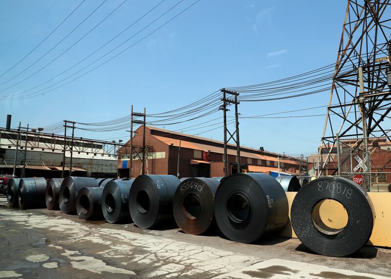 FILE - Rolls of finished steel are seen at the U.S. Steel Granite City Works facility Thursday, June 28, 2018, in Granite City, Ill. (AP Photo/Jeff Roberson, File)
