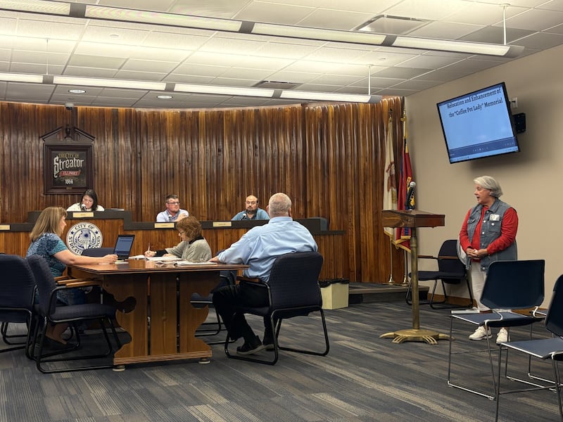 Barb Craig speaks to Streator City Council members on Wednesday, May 20, 2026, presenting a proposal to relocate the “Coffee Pot Lady” memorial from the former Santa Fe Depot site to City Park.