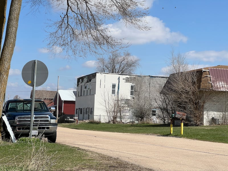The siding of a multi-unit residence in Fairdale remains in disarray on April 11, 2025, 10 years and two days after an EF-4 tornado destroyed more than a third of the town's buildings.