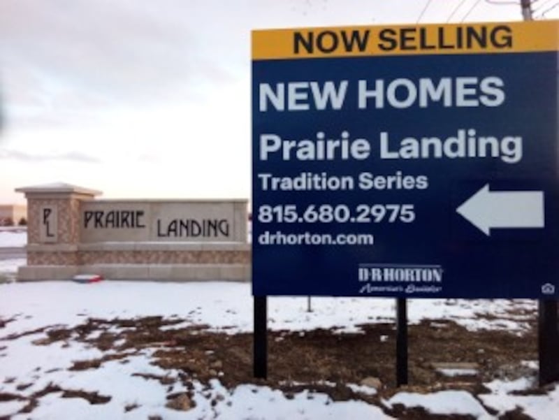 A sign off Essington Road in Joliet points passers by to the Prairie Landing subdivision under construction. Feb. 3, 2025