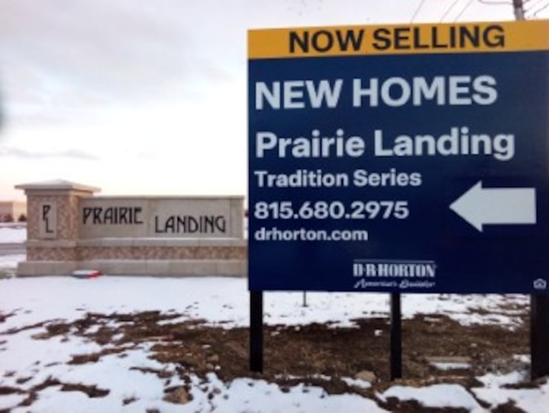 A sign off Essington Road in Joliet points passers by to the Prairie Landing subdivision under construction. Feb. 3, 2025