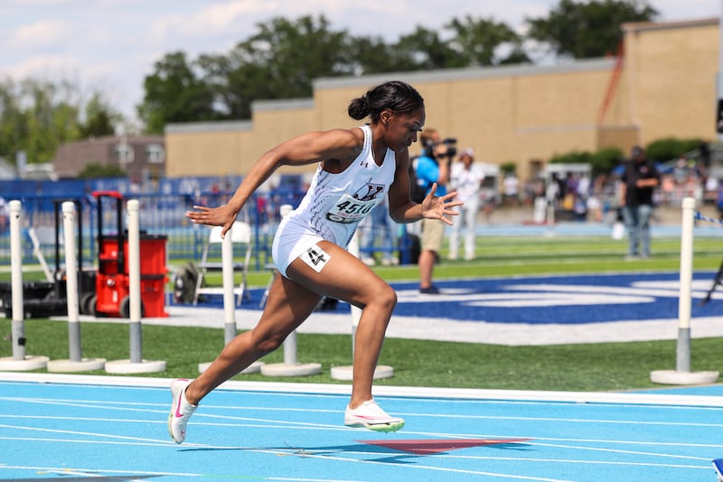 Kankakee’s Naomi Bey-Osborne takes off in the 400 m dash during the IHSA Class 3A Girls Track & Field State Finals on Saturday, May 24, 2025.