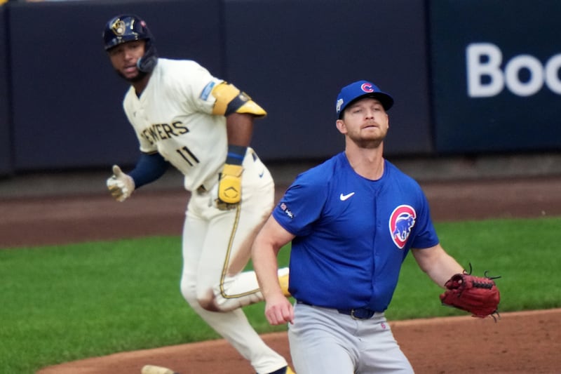 Chicago Cubs pitcher Matthew Boyd watches as Milwaukee Brewers' Jackson Chourio hits a two-run scoring single during the first inning of Game 1 of baseball's National League Division Series Saturday, Oct. 4, 2025, in Milwaukee. (AP Photo/Morry Gash)