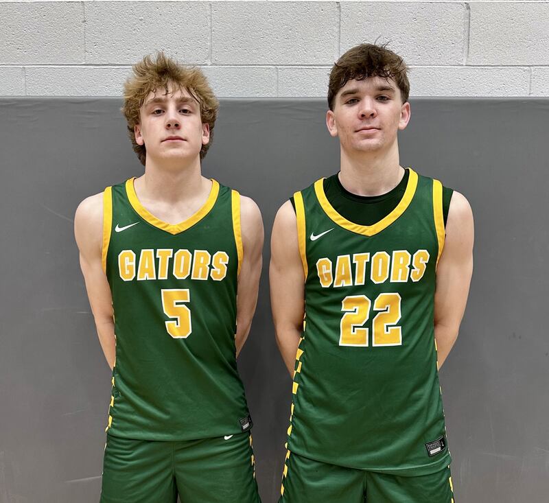 Carson Trivellini (left) finished with 26 points and 5 rebounds, while Nick Stowasser (right) had 12 points and 8 rebounds in a 63-60 win over Burlington Central.