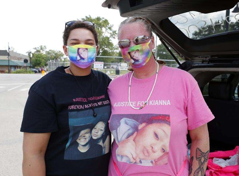 Micah Galvin (left) and Fiona Galvin participate in a rally in 2020 to find Fiona's daughter and Micah's sister Kianna Galvin of South Elgin, who has been missing since 2016.
