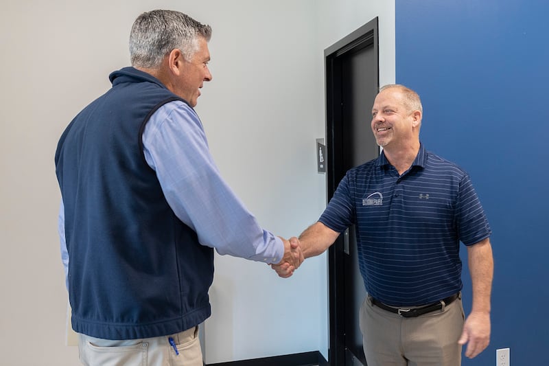 U.S. Rep. Darin LaHood (left) greets Dixon Park District Executive Director Duane Long on Friday, Oct. 18, 2024, at The Facility in Dixon.