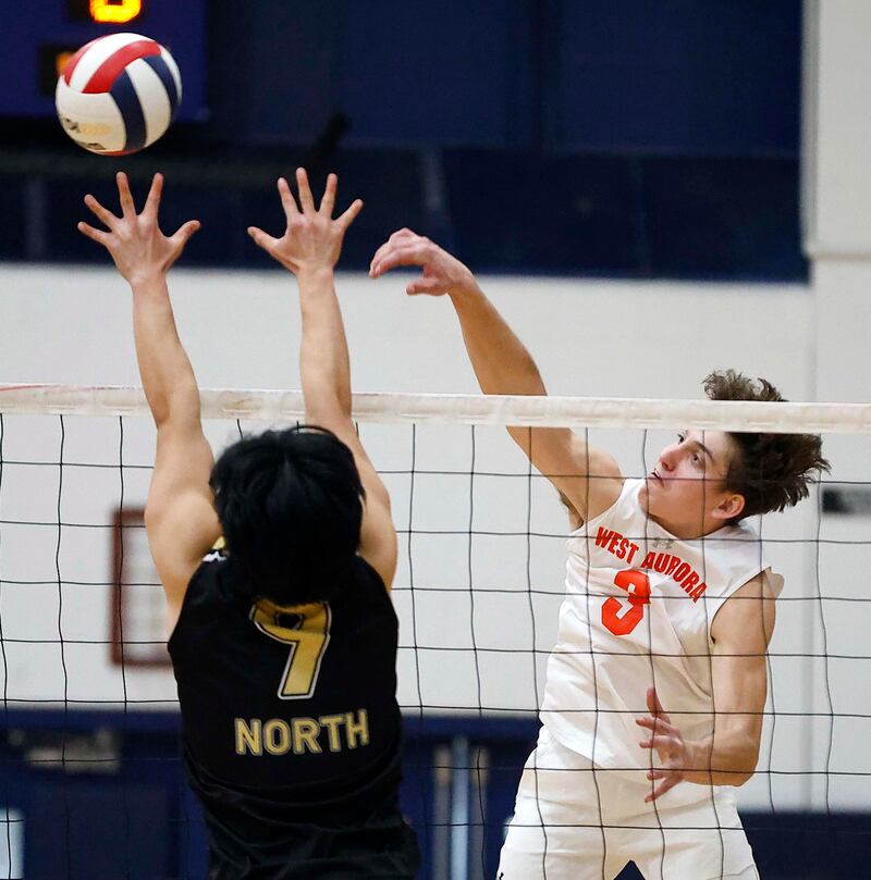 West Aurora’s Tucker Dickson, (3) pushes the ball past Glenbard North’s Joshua Mejia (9) during the West Aurora Blackhawk Invite boys volleyball tournament Saturday, April 5, 2025 in Aurora Ill.