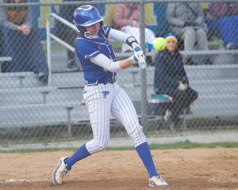 Wheaton North's Ava Hartnett contest for a homer against St. Charles East on Monday, April 21, 2025 In Wheaton.