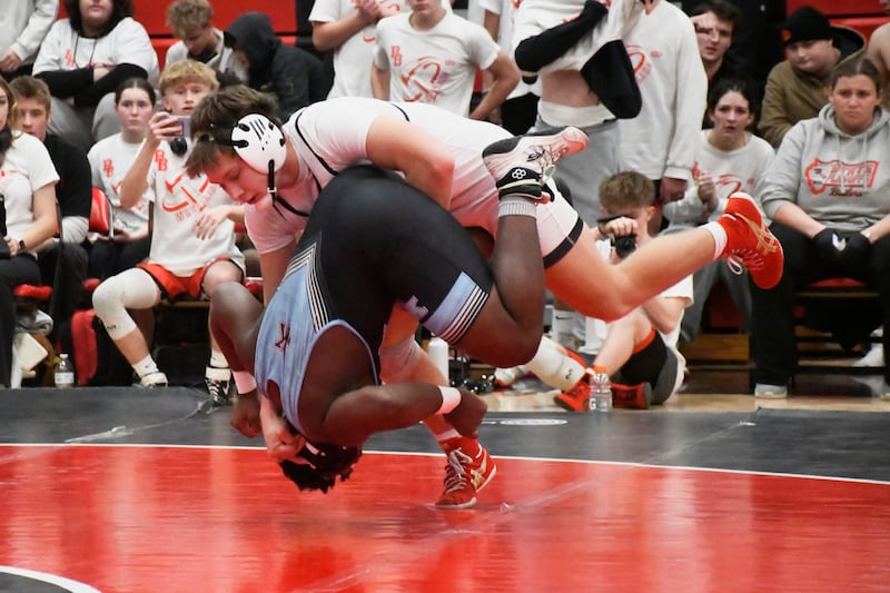 Bradley-Bourbonnais' Kayden Roach suplexes Kankakee's Charles Hill during the All-City wrestling meet on Wednesday, Dec. 3, 2025.