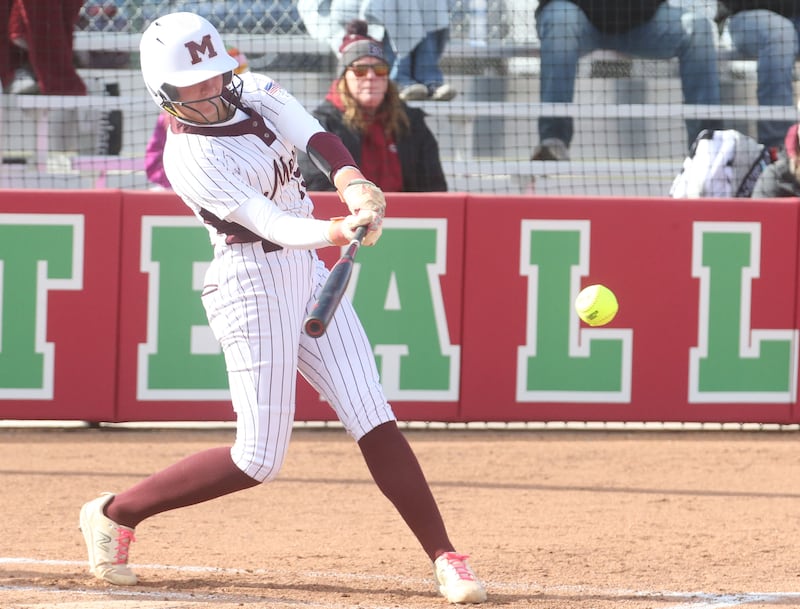 Morris's Addy Hackett makes contact with the ball while playing L-P on Monday, April 7, 2025 at the L-P Athletic Complex in La Salle.