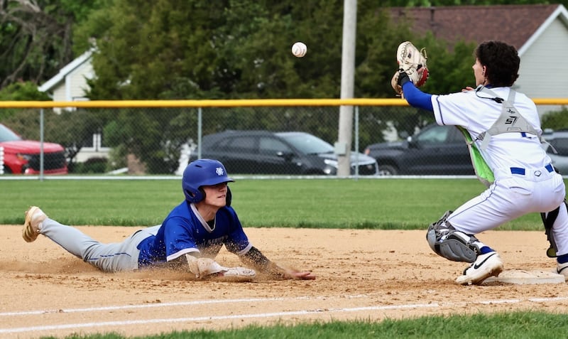 Princeton catcher Stihl Brokaw takes the throw at first base on a rundown after the Tigers picked off Newman's Garret Matznick in the first inning of Tuesday's game at Prather Field. The Comets won 9-1.
