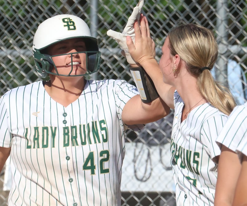St. Bede's Ava Balestri hi-fives teammate Leah Griggs after hitting a home run against Dwight on Friday, May 15, 2026 at St. Bede Academy.