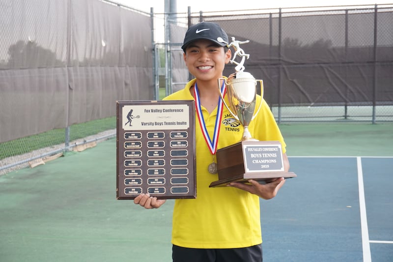 Jacobs freshman Samuel Santa Ines celebrates after the Golden Eagles won the Fox Valley Conference Tournament.