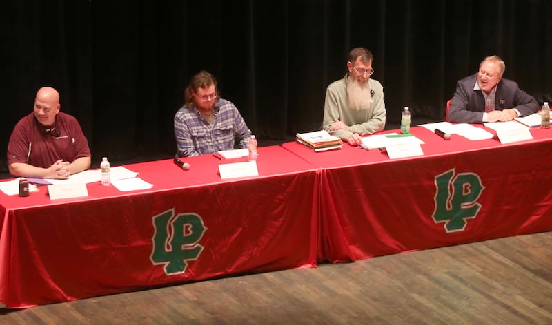 La Salle mayor candidates (from left) Jeff Grove, Tyler Thompson, Jamie Hicks and Gary Hammers speak during the La Salle Mayor Forum on Wednesday, March 19, 2025 in Matthiessen Auditorium at La Salle-Peru Township High School.
