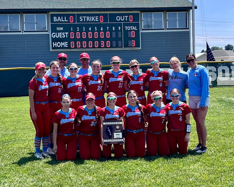 The Ottawa softball team poses with its plaque after defeating Geneseo 3-0 on Saturday, May 23, 2026 to win the Class 3A Geneseo Regional. It is the Pirates' fourth regional title in a row.