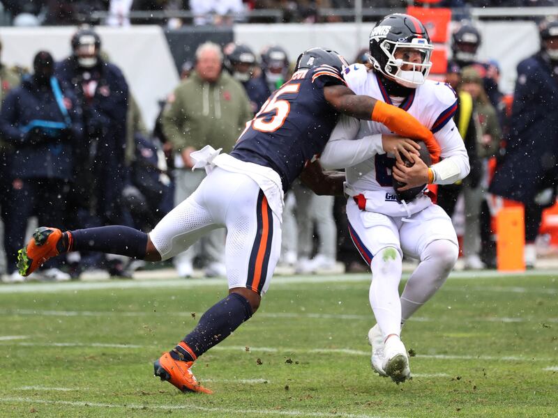 Chicago Bears safety C.J. Gardner-Johnson sacks New York Giants quarterback Jaxson Dart Sunday, Nov. 9, 2025, during their game at Soldier Field in Chicago.