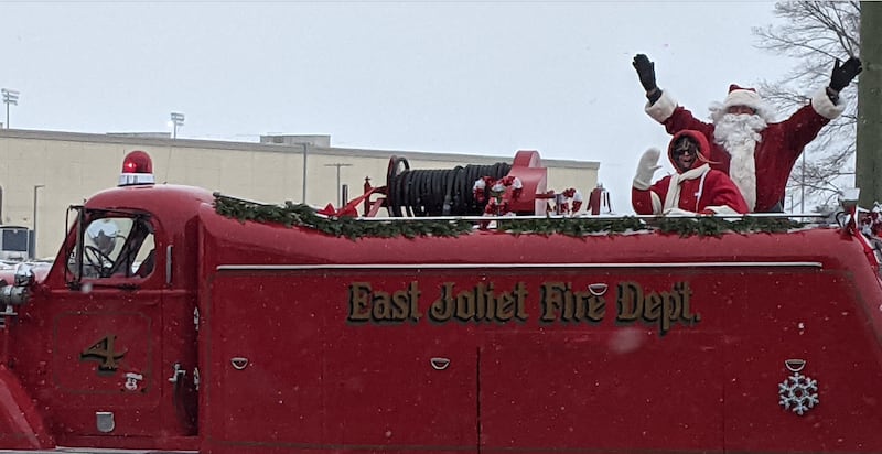 In the face of frigid cold temperatures and light snow, Joliet police, fire and public works vehicles escorted Santa Claus through Joliet before he heads off to the North Pole as part of the annual Santa Send-Off on Saturday, Dec. 13, 2025.