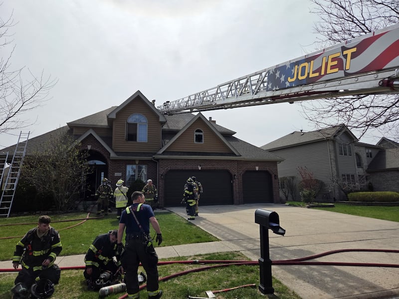 Joliet firefighters at the scene of a fire on Monday, April 14, 2025, in the 6200 block of Ventura Drive.
