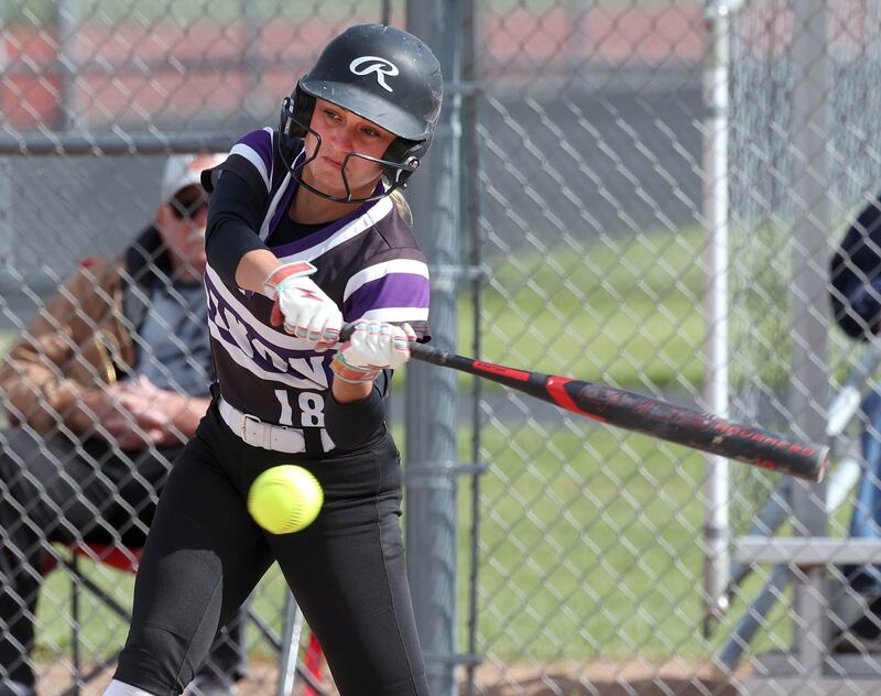 Dixon’s Bailey Tegeler takes a cut Thursday, May 22, 2025, during their game at DeKalb High School.