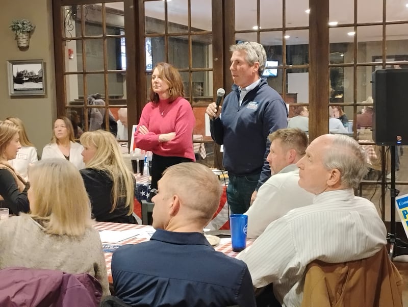 Patrice Bertheau and Karsten Pawlik speak about Geneva issues in the April 1 consolidated election at a Geneva Township GOP event Feb. 24, 2025. Pawlik is challenging incumbent Mayor Kevin Burns and Bertheau is running for 5th Ward against two other newcomers, Jeff Palmquist and Kim Edwards.