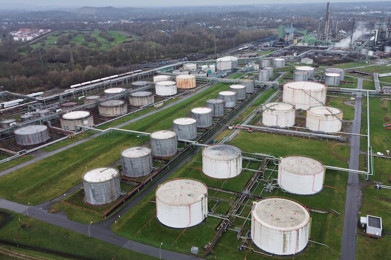 Big oil tanks are pictured in front of the BP refinery in Gelsenkirchen, one of the biggest fuel producers in Germany, Wednesday, March 11, 2026. (AP Photo/Martin Meissner)